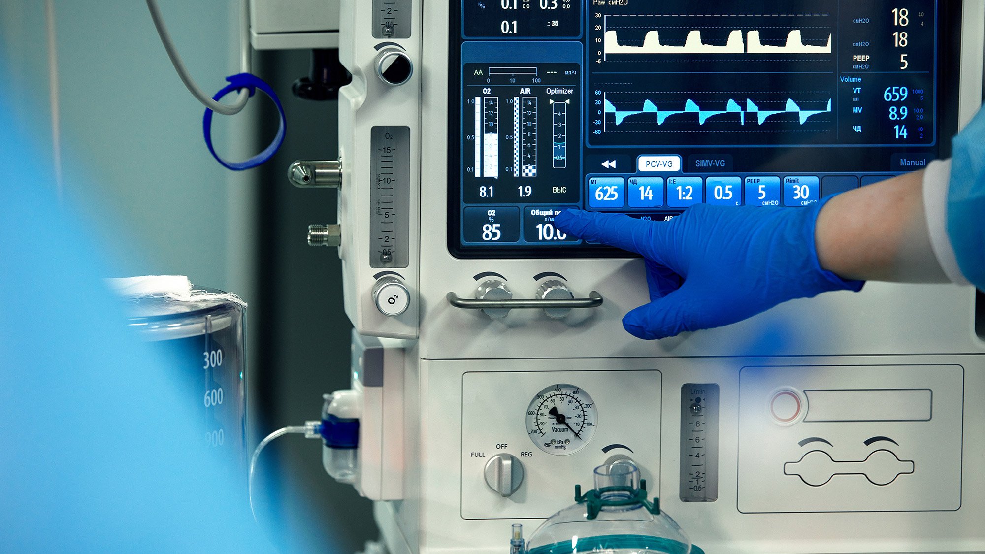 A hospital room featuring a patient connected to an IV machine for medical care.